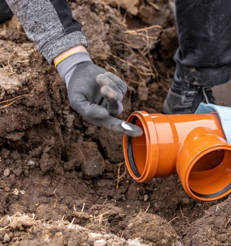 plastic pvc waste sewer pipe in the ground. High quality photo