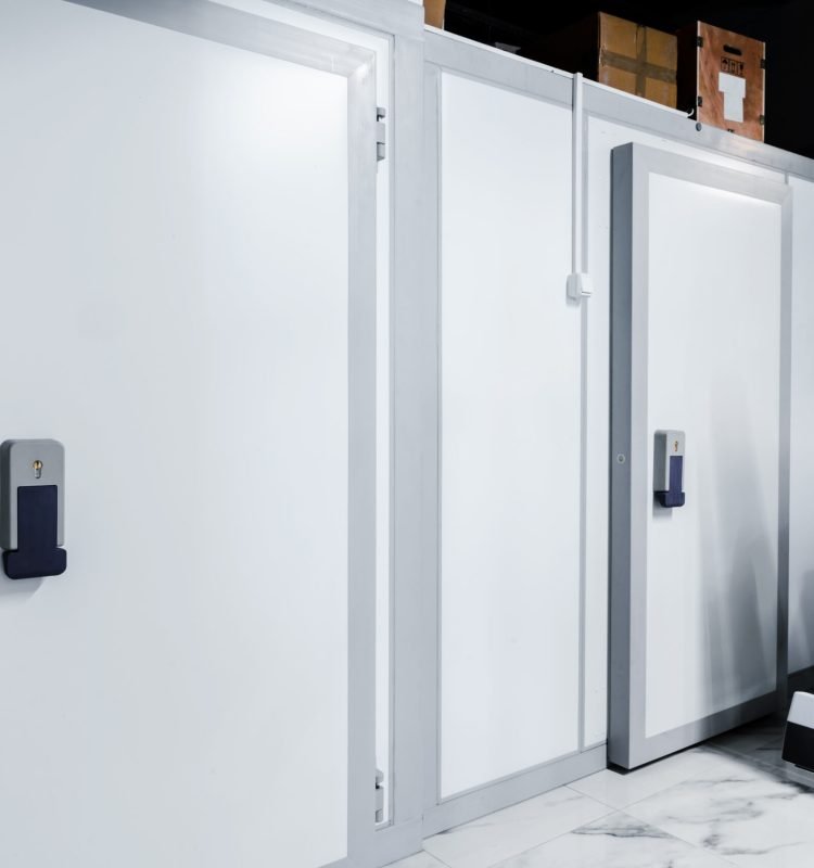 Refrigerator room door in professional kitchen in restaurant close up